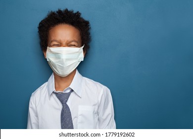 Black Child Boy In Medical Protective Face Mask Laughing, Portrait