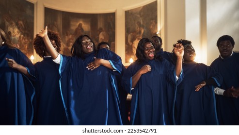 Black Christian Gospel Singers in Church Clapping and Stomping, Praising Lord Jesus Christ. Warm Atmosphere in Church Thanks to Energetic Choir Singing Uplifting Music with Emotions and Happiness