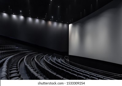 Black Cinema White Wide Screen And Auditorium Seats
