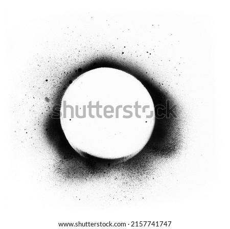 Black circle sprayed with ink