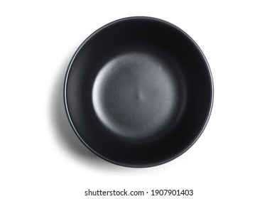 Black clay cup isolated on white background. View from above