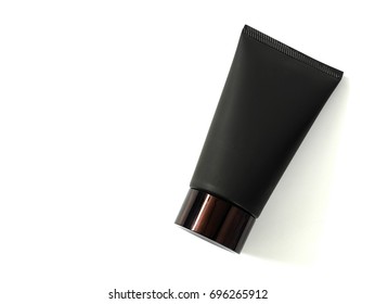 Black Cleanser Tube Isolated On White Background. Top View. Copy Space.