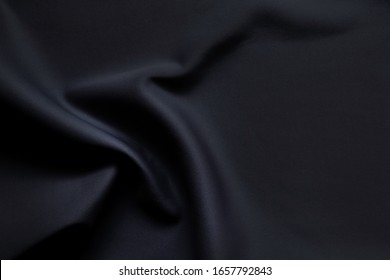 Black cloth background and texture.Minimalist black 2020  Trend