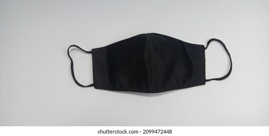 Black Cloth Mask On A White Background