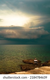 black clouds gathering over the coast line, storm approaching - Shutterstock ID 2184784639