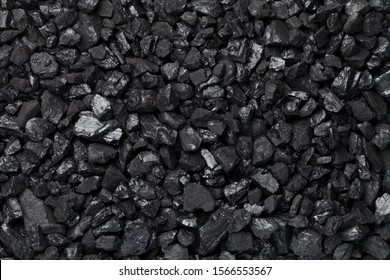 Black coal background. Pea coal. Top view