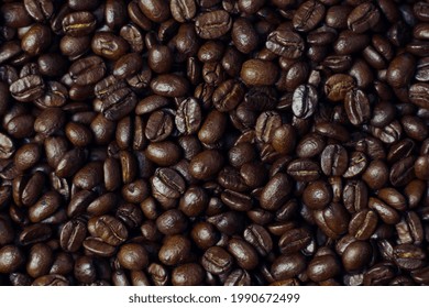 Black coffee beans texture background, coffee beans