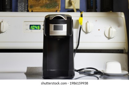 A Black Coffee Brewer On A Stovetop