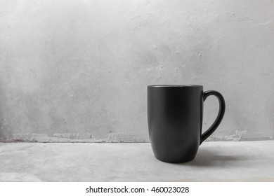 Black Coffee Mug On Concrete Table