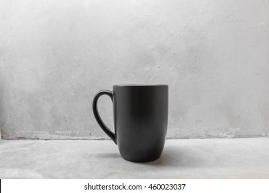 Black Coffee Mug On Concrete Table