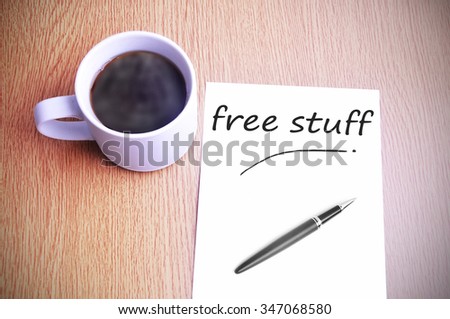 Black coffee on the table with note writing free stuff