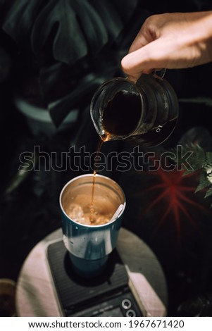 Similar – Senior Paar Hände gießen Kaffee aus der Thermoskanne.