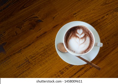 Black coffee is in a white glass, placed on a black background.In top view.Copy Space. - Shutterstock ID 1458009611