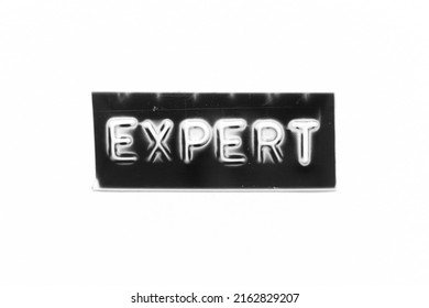 Black color banner that have embossed letter with word expert on white paper background - Shutterstock ID 2162829207