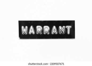 Black Color Banner That Have Embossed Letter With Word Warrant On White Paper Background