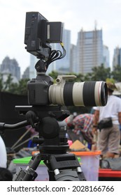 Black Color Dslr Camera, Lens Size 55-300, With Black Monitor And Black Tripod At A Motorcycle Modification Event, Senayan, Kebayoran Baru, South Jakarta, Indonesia, 12 April 2013