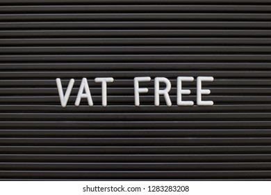 Black color felt letter board with white alphabet in word vat free background
