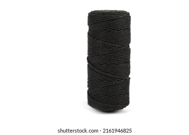 Black Color Skein Single Strand Cotton Cord Rope For Macrame On White. Use For DIY Handcraft. Closeup Textile Bobbin Reel