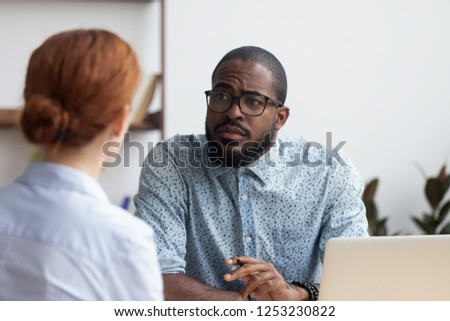 Black company owner searching for workforce. African executive manager listening candidate female consider her unsuitable for job position. Hr, bad first impression and failing work interview concept