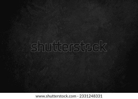 
Black concrete background texture with vignetting.