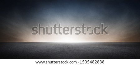 Black Concrete Floor with Dramatic Sky Horizon Presentation Background Scene