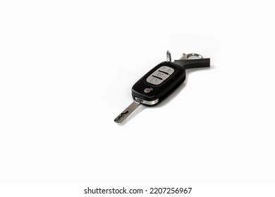 Black Controlled Car Key And Metal Enclosure Key.SELECTİVE FOCUS