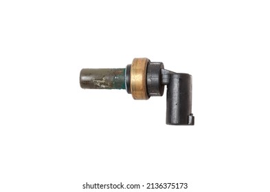 Black Coolant Temperature Sensor On A White Background With Yellow Metal Elements. The Engine Control Unit Corrective Composition Of The Air-fuel Mixture, The Engine Idle Speed, The Ignition Timing.