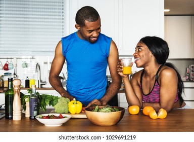 Black Couple Cooking Healthy Food In The Kitchen