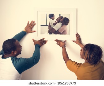 Black Couple Hanging Fmily Photo