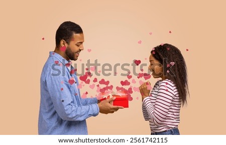 Similar – Image, Stock Photo Affectionate couple sharing a cozy moment on a sofa