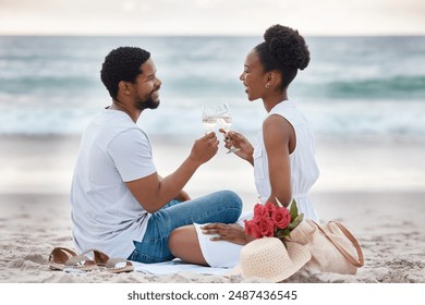 Black couple, toast and relax on sand by beach for romantic date on vacation, anniversary getaway and bonding. Man, woman and together with white wine, ocean escape and commitment for love connection - Powered by Shutterstock