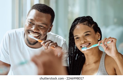 Black couple, toothbrush and dental wellness in bathroom together for grooming, beauty hygiene and healthcare. African man, woman and happy oral care or brushing teeth for healthy morning routine - Powered by Shutterstock