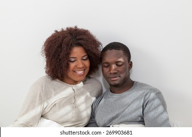 Black Couple Using The Ipad