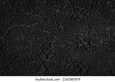 Black Cracked Texture Background. Dark, Beautiful, Abstract Pattern Nature Backdrop. Old, Dry, Deserted Surface Of Tar, Pitch, Resin Or Soil. Eerie Grooves And Scratches. Close Up, Copy Space