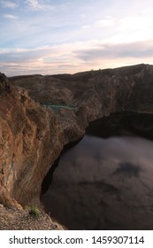 Black Crater Lake At Mount Kelimutu During Sunrise