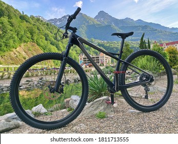 Black Cross Country Mountain Bike At Mountains Background In Rosa Khutor Resort (Krasnaya Polyana, Russia)