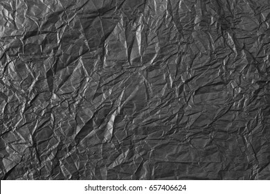 Black Crumpled Paper Texture Background