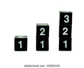 Black cubes, number 1, 2, 3 arranged on stacks isolated on white background