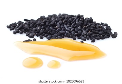 Black Cumin Oil On White Background