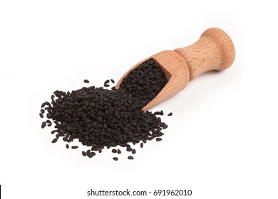 Black Cumin Seed In Wooden Scoop Isolated On White Background, Nigella Sativa