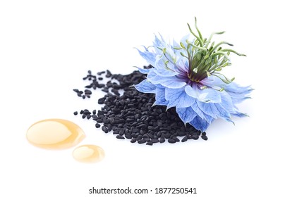 Black Cumin Seeds And Drop Oil With Nigella Sativa Flower On White Background