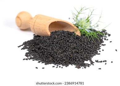 Black cumin seeds, Nigella sativa, against white background