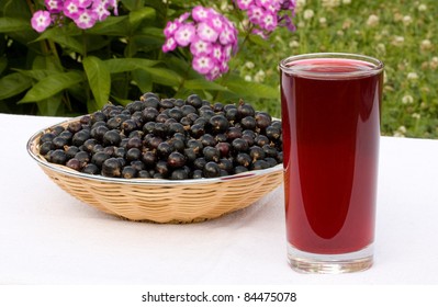 Black Currant And A Glass Of Juice