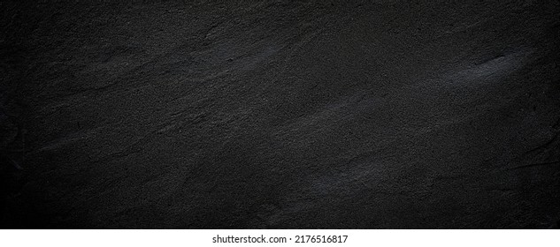 Black or dark gray rough grainy stone or sand texture background - Shutterstock ID 2176516817