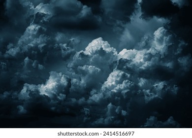 Black dark greenish blue sky with clouds. Dramatic background. Thunderstorm storm hurricane rain wind thunder lightning. Night moonlight. Creepy ominous frightening danger nightmare horror.Epic mystic - Powered by Shutterstock