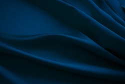 Black Dark Navy Blue Silk Satin Fabric Cloth. Soft Folds. Luxury Elegant Background For Design. Wavy Lines. Beautiful. Birthday, Christmas, New Year.