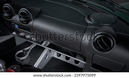 Black dashboard inside of a car