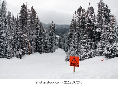 Black Diamond Ski Run. Caution Sign. Showdown Montana. Background