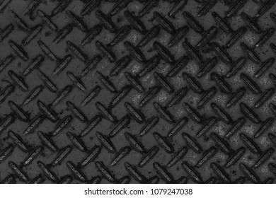 Black diamondplate floor background anf pattern