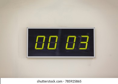 Black digital clock on a white background showing time hours minutes  - Shutterstock ID 785925865